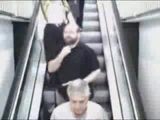 Woman Falling Down Escalator